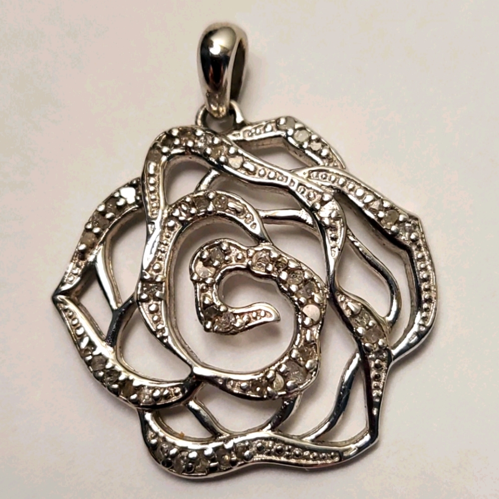 Diamond charm. Rose design sterling silver